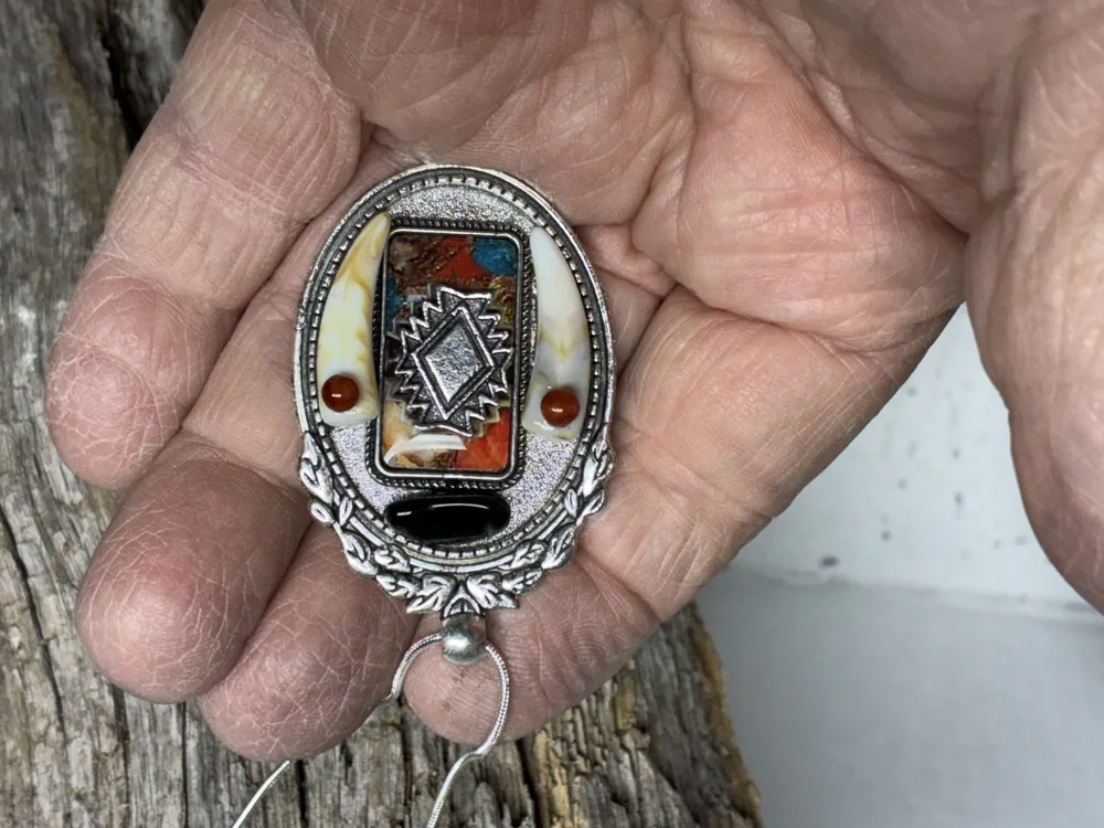 Obsidian and Ruby Eye Wolf Tooth Pendant on Silver Snake Chain, photo 6 of 7
