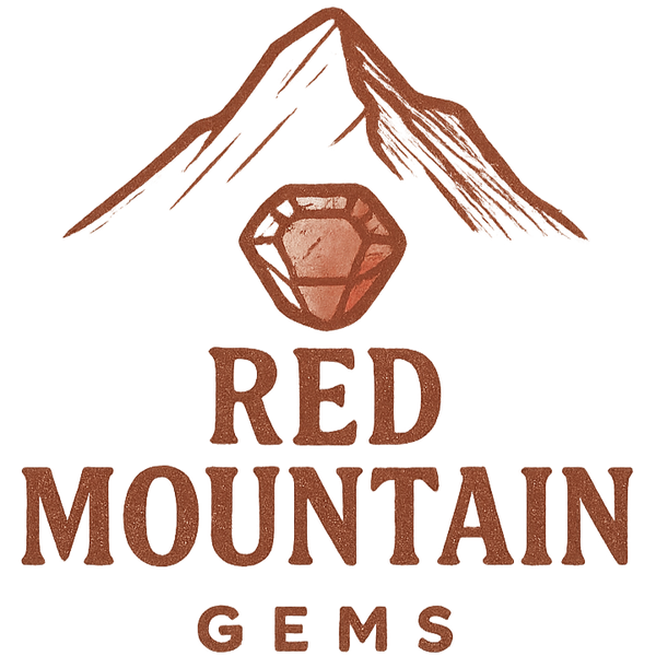Logo of Red Mountain Gems with a mountain and gemstone illustration on a white background